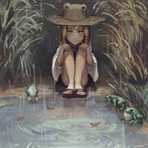 Little Frog bored in the rain